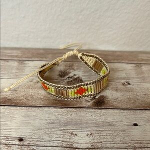 Altamar Handcrafted Beaded Bracelet with Gold and Orange Accents